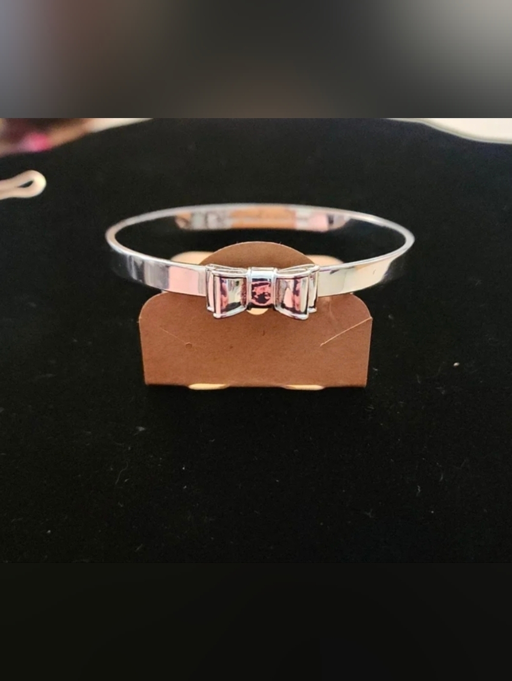 Kate Spade New York 'Take a Bow' Silver Tone Bangle Bracelet 2.5"